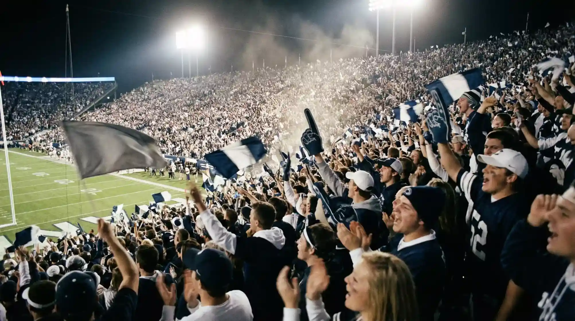 NFL Heimvorteil — volle Fantribüne mit Fahnen und Schals in einem American-Football-Stadion